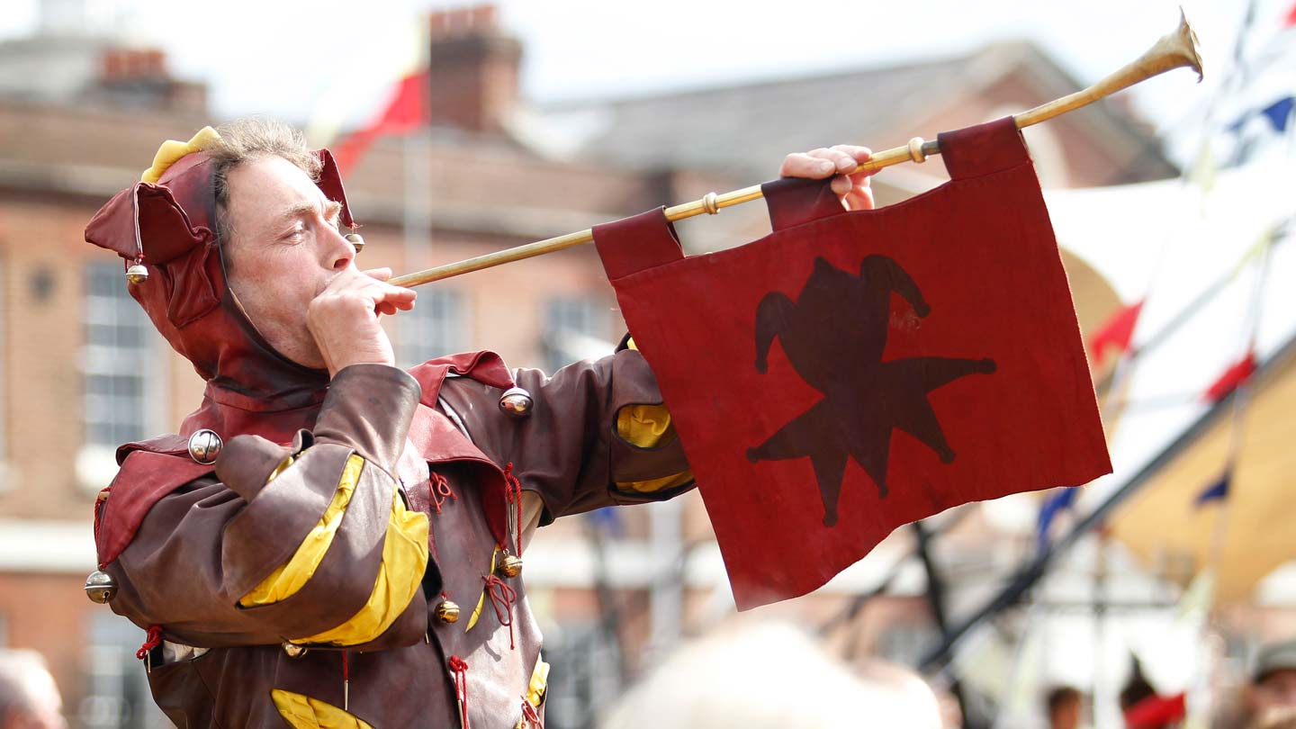 A Tudor jester outside The Mary Rose museum